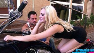 A depraved blonde is happy to fuck with a real biker