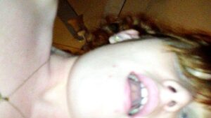 A redhead girl rides a dick and shows her pleasure on camera