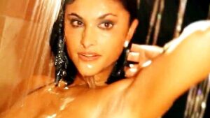 Indian woman spicily washes in the shower and gets high